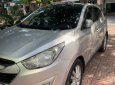 Cần bán Hyundai Tucson 2.0 AT 4WD năm sản xuất 2010, màu bạc 