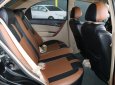 Cần bán Chevrolet Aveo LTZ 1.5AT đời 2013, màu đen, 296 triệu
