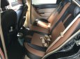 Bán Chevrolet Aveo LTZ 1.5AT màu đen VIP, số tự động, sản xuất 2013, biển Sài Gòn, đi 33000km