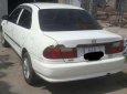 Bán Mazda 323 1999, màu trắng, xe gia đình