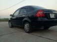 Gia đình bán xe Daewoo Gentra SX 1.5 MT 2010, màu đen, giá chỉ 165 triệu