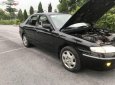 Bán ô tô Mazda 626 2.0 MT năm 2000, màu đen số sàn, giá tốt