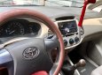 Cần bán lại xe Toyota Innova E 2014, màu bạc chính chủ