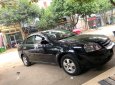 Bán Chevrolet Lacetti 2012, màu đen xe còn mới nguyên