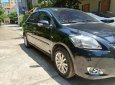 Chính chủ cần bán chiếc Toyota Vios 1.5E 2014, màu đen, giá cực rẻ