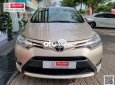 Cần bán lại xe Toyota Vios 1.5E sản xuất 2016, màu vàng