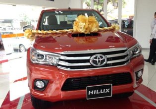 Cần bán Toyota Hilux 2.5E đời 2015, màu đỏ, 693 triệu giá 693 triệu tại Tp.HCM
