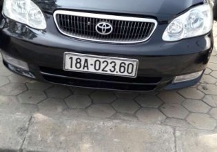 Cần bán lại xe Toyota Corolla J đời 2002, màu đen, giá tốt giá 245 triệu tại Ninh Bình
