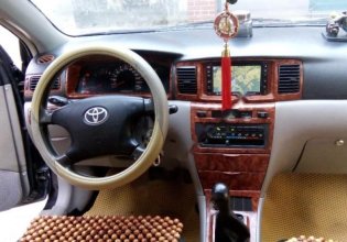 Bán Toyota Corolla altis 1.8MT sản xuất 2004, màu đen giá 265 triệu tại Nghệ An
