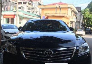 Bán lại chiếc Toyota Camry 2.4G đời 2010, màu đen, đang dùng tốt giá 680 triệu tại Hà Giang