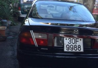 Cần bán xe Mazda 323 g sản xuất năm 2001, màu đen, xe nhập giá 120 triệu tại Hà Nam