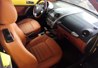 Xe Volkswagen New Beetle mui trần, đăng ký lần đầu 2003, màu vàng xe nhập giá 399 triệu tại Khánh Hòa