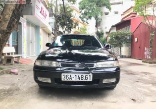 Cần bán xe Mazda 626 1997, màu đen, nhập khẩu nguyên chiếc  giá 190 triệu tại Thanh Hóa