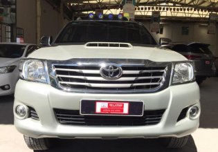 Bán Toyota Hilux 2.4E đời 2014, màu bạc, xe bán tải máy dầu, số sàn, giá còn thương lượng giá 560 triệu tại Tp.HCM