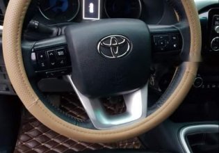Cần bán gấp Toyota Hilux G đời 2015, màu đen, nhập khẩu nguyên chiếc số sàn giá 595 triệu tại Nghệ An