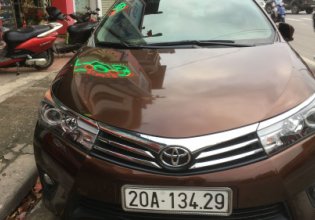 Cần bán Toyota Corolla altis 1.8 AT năm 2015, màu nâu giá 660 triệu tại Thái Nguyên
