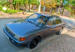 Cần bán Mazda 323 1.6 MT năm sản xuất 1996, màu xám  giá 65 triệu tại Hà Nam