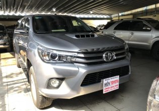 Cần bán Toyota Hilux G sản xuất 2015, màu bạc, nhập khẩu giá 700 triệu tại Tp.HCM