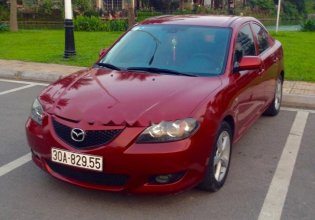Bán xe Mazda 3 1.6 AT sản xuất năm 2004, đăng ký 2005, màu đỏ mận, số tự động giá 270 triệu tại Hà Nội