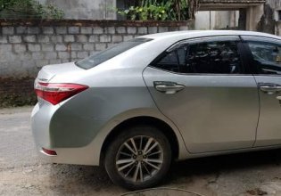 Cần bán Toyota Corolla Altis 1.8G đời 2015, màu bạc   giá 595 triệu tại Nam Định