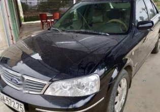 Cần bán xe Ford Laser Ghia sản xuất năm 2004, màu đen giá 180 triệu tại Vĩnh Phúc