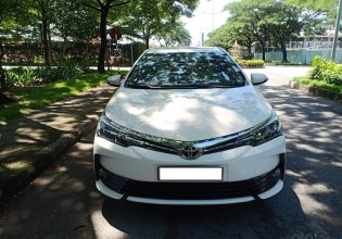 Bán Toyota Altis 1.8G năm 2018, màu trắng, xe sử dụng rất ít, bán 740tr giá 740 triệu tại Bình Dương
