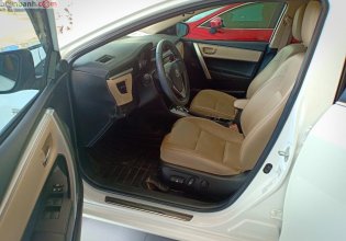 Cần bán lại xe Toyota Corolla altis 1.8G đời 2015, màu trắng giá 640 triệu tại Khánh Hòa