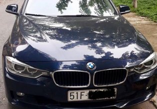 Bán BMW 320i sản xuất 2015, màu xanh đen, đi 36.000km, chính chủ bán giá 950 triệu tại Tp.HCM