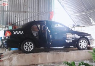 Cần bán xe Kia Spectra đời 2004, màu đen giá 117 triệu tại Bình Định