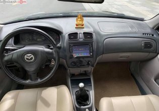 Cần bán xe Mazda 323 đời 2003, màu đen, xe đẹp  giá 160 triệu tại Tuyên Quang