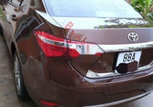 Chính chủ bán xe Toyota Corolla altis 1.8G AT năm sản xuất 2015, màu nâu giá 620 triệu tại Vĩnh Phúc