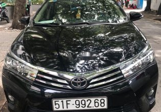 Cần bán xe Toyota Corolla altis 1.8 đời 2015, màu đen, nhập khẩu, xe nguyên bản giá 650 triệu tại Tp.HCM
