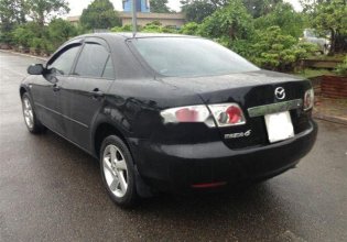 Bán Mazda 6 MT năm 2003, màu đen, nhập khẩu nguyên chiếc, giá tốt giá 325 triệu tại Tp.HCM