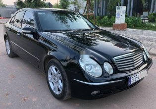 Chính chủ bán xe Mercedes E240 đời 2005, màu đen giá 335 triệu tại Hà Nội