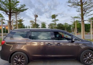 Cần bán xe Kia Sedona 3.3 GATH sản xuất 2015, màu nâu, nhập khẩu nguyên chiếc xe gia đình giá 680 triệu tại Bình Dương