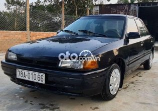 Cần bán xe Mazda 323 MT năm sản xuất 1994, màu đen, xe nhập, giá chỉ 39 triệu giá 39 triệu tại Đắk Lắk