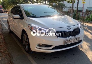 Cần bán lại xe Kia K3 2.0AT năm 2015, màu trắng giá 439 triệu tại Đồng Nai