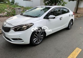Cần bán lại xe Kia K3 1.6AT sản xuất 2015, màu trắng giá 428 triệu tại Đồng Nai