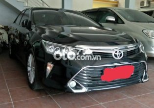 Cần bán lại xe Toyota Camry 2.0E năm sản xuất 2019, màu đen  giá 810 triệu tại Hà Nội